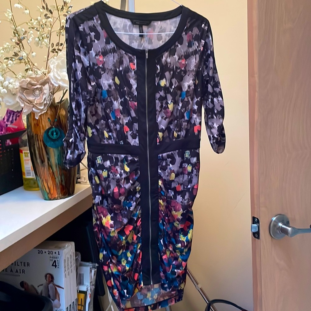 BCBG max area size large woman’s dress. Zipper up front three-quarter sleeves.